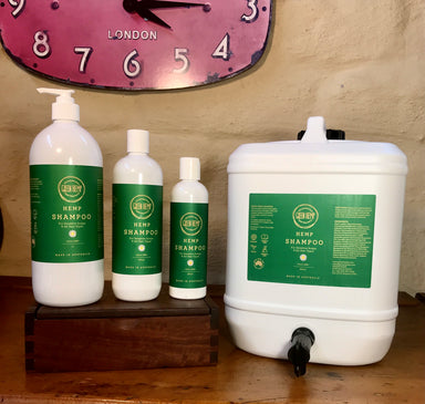Green Hemp Shampoo products, including 250ml, 500ml, 1-liter bottles, and a 10-liter